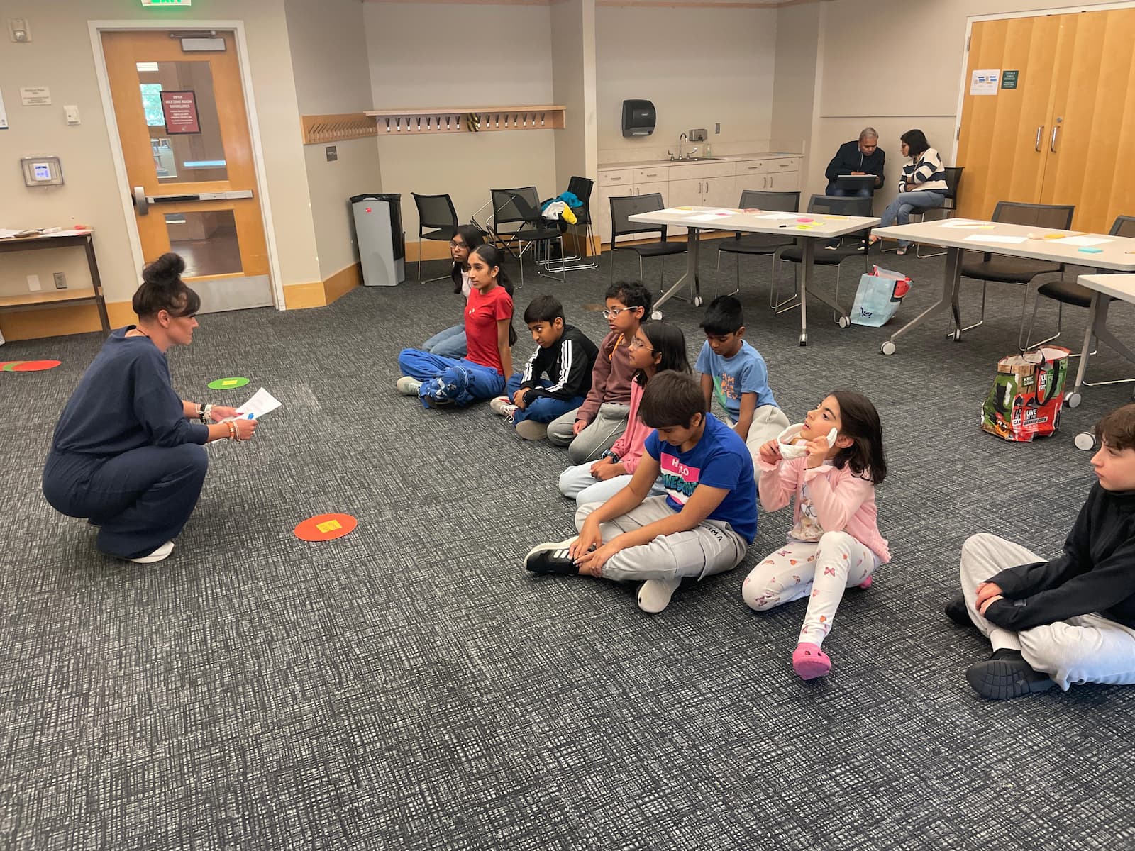 A child sharing an idea with the group at The Situation Room